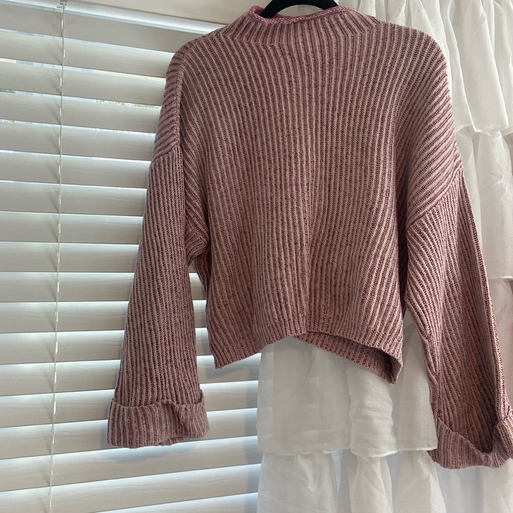Knitted purple and white sweater